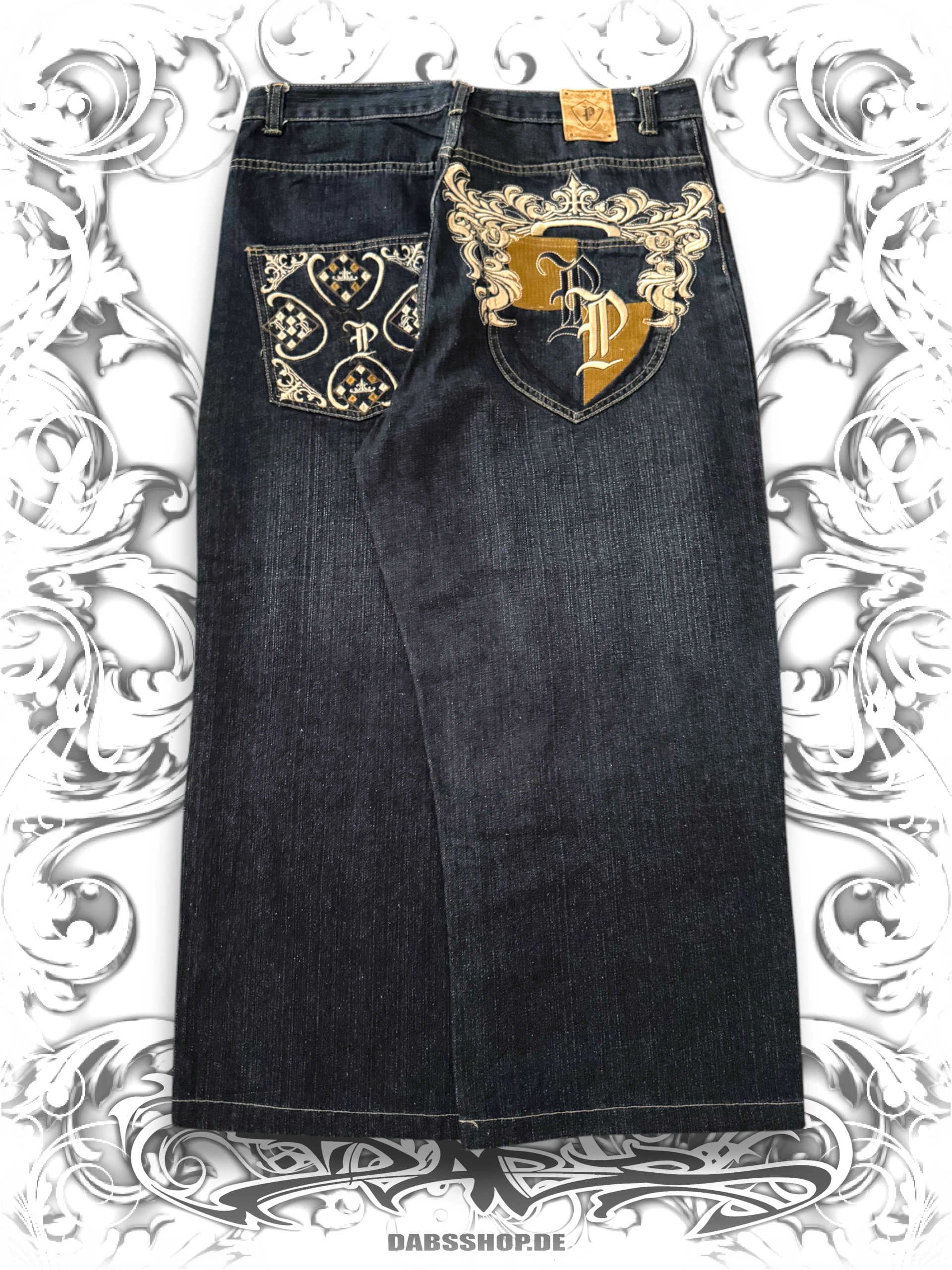 Pelle Pelle embroidered insignia baggy pants with detailed embroidery and a wide leg fit, 2000s hip hop style