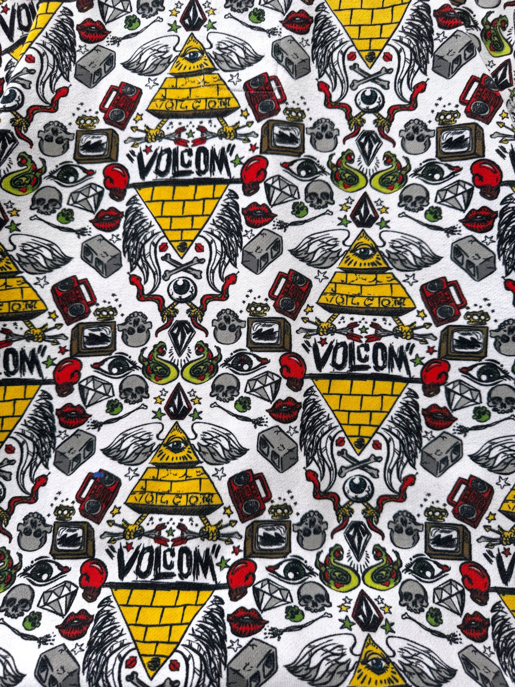 Volcom x Ryan Sheckler Zip Hoodie with the iconic all over print containing skulls, diamonds, snakes and the eye of providence