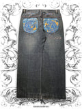 Coogi embroidered vintage baggy pants with a relaxed fit and detailed embroidery