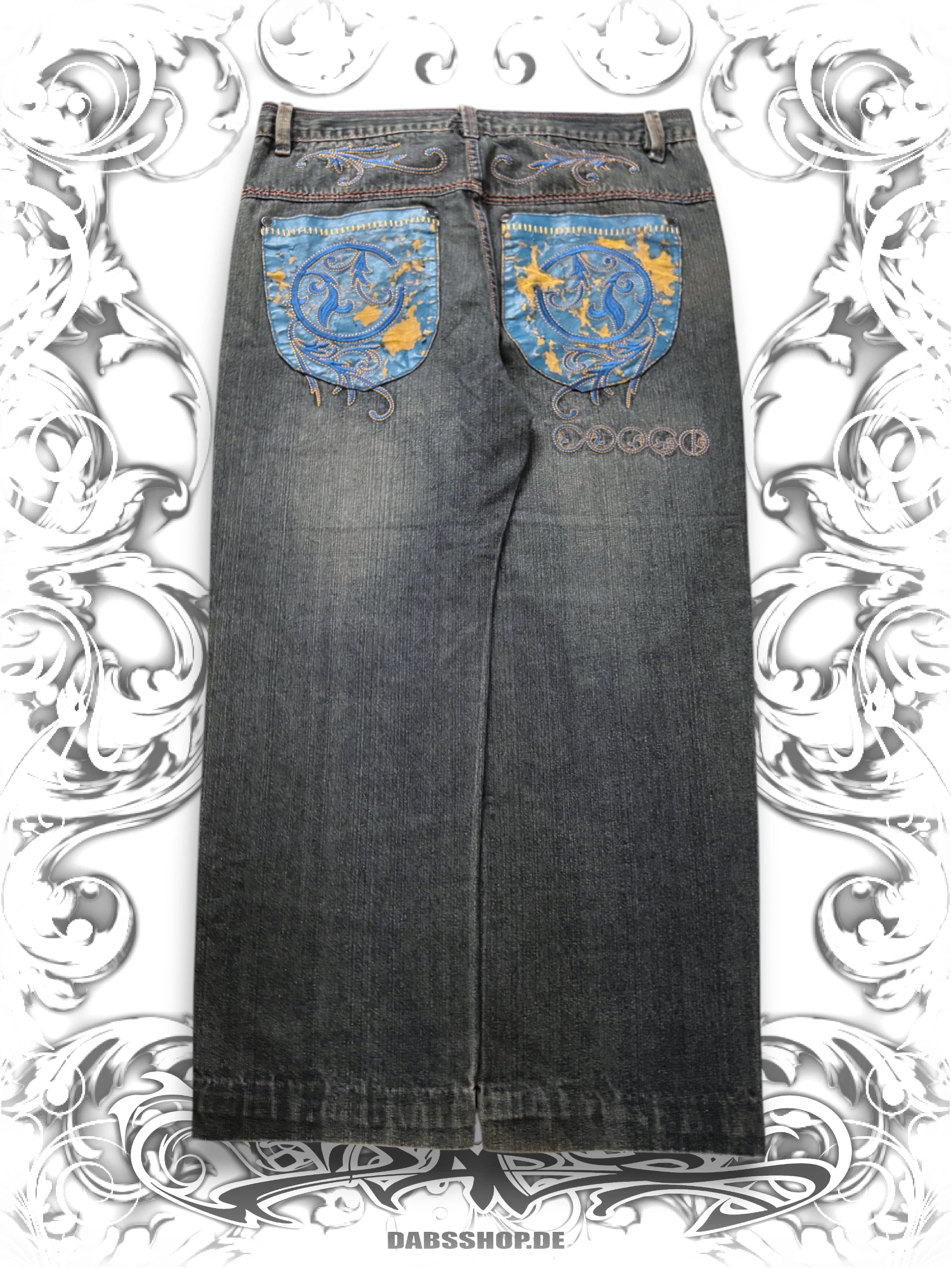 Coogi embroidered vintage baggy pants with a relaxed fit and detailed embroidery