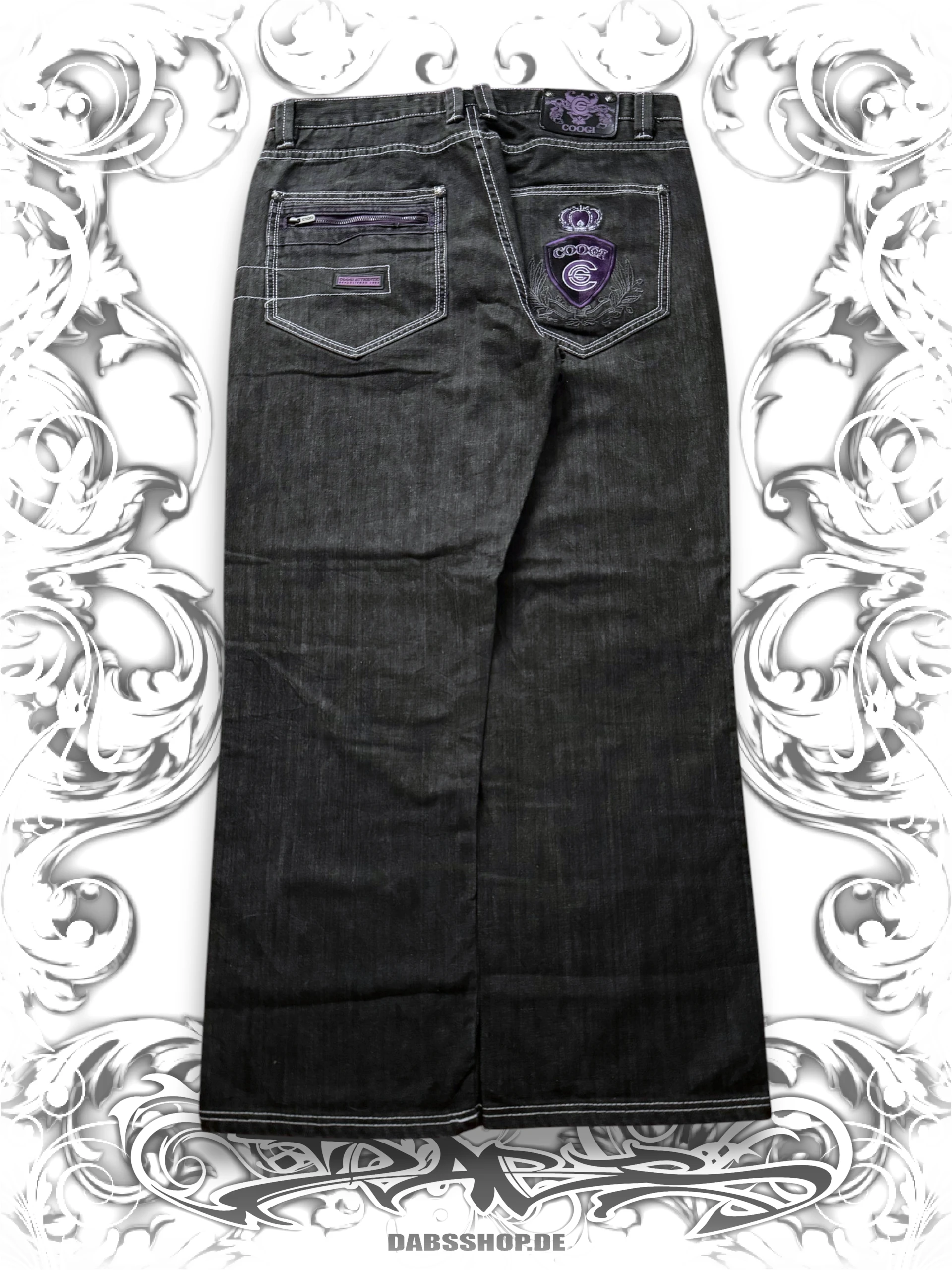 Coogi black vintage baggy pants with embroidered purple crown and a relaxed 2000s hip hop style