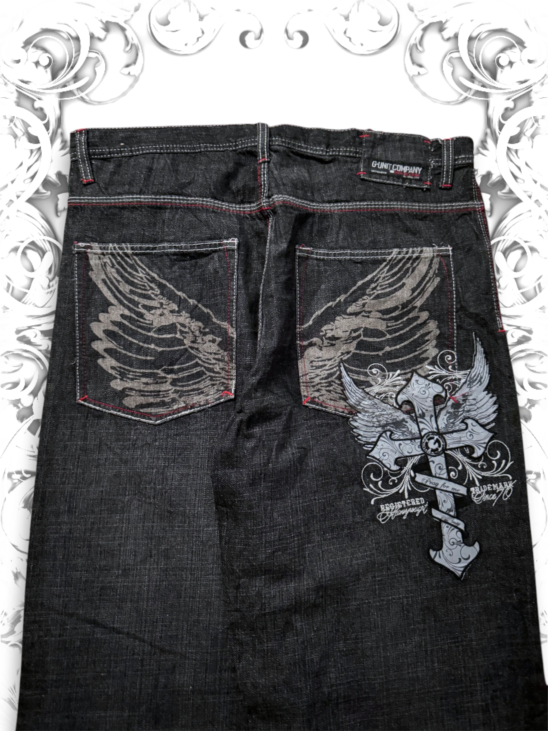 G-Unit vintage baggy pants with winged cross graphic and relaxed 2000s hip hop streetwear style