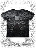 Xtreme Couture 2000s T-shirt with winged skull graphic and alternative Y2K style